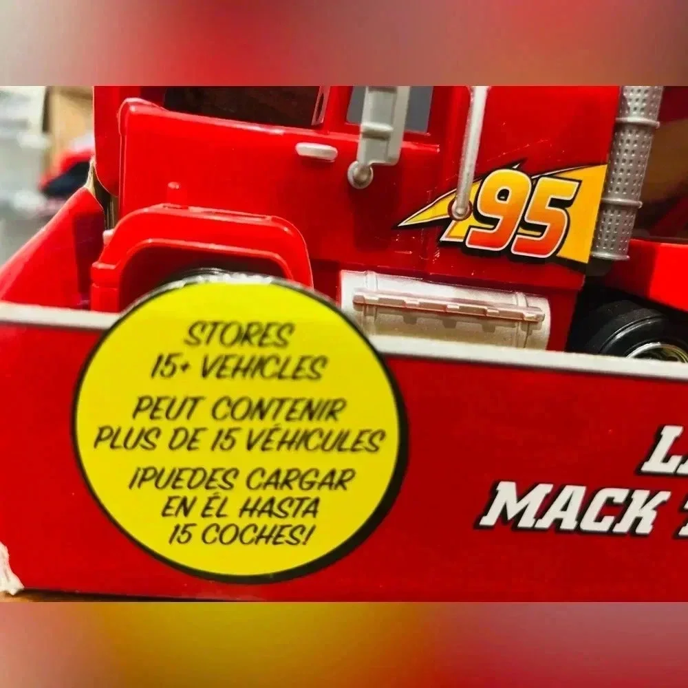 Disney Pixar Cars Launching Mack Transporter Truck Playset - Red Dinoco Transpor